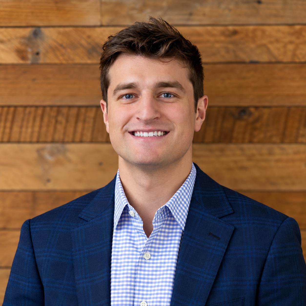 Confident Corporate Portrait in Rustic Wood Setting